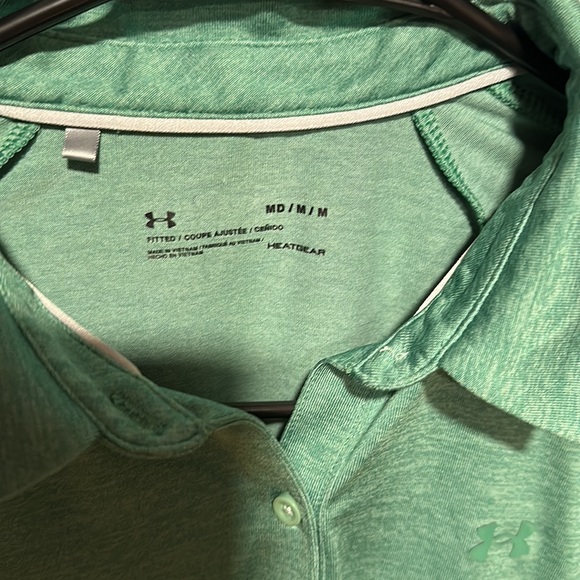 UA Women golf shirt. - Picture 3 of 4